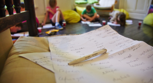 A close-up of a piece of paper at a writing workshop for children